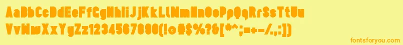 フォントTesUltrablack – オレンジの文字が黄色の背景にあります。