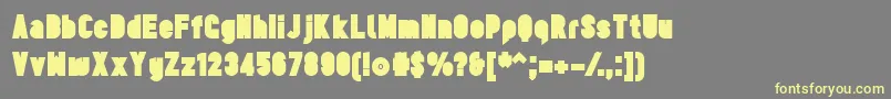 TesUltrablack-Schriftart – Gelbe Schriften auf grauem Hintergrund