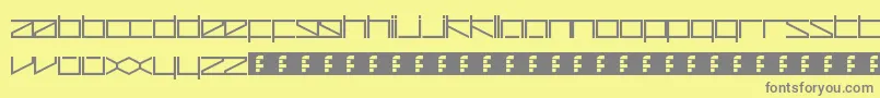 ZetaRedux-fontti – harmaat kirjasimet keltaisella taustalla