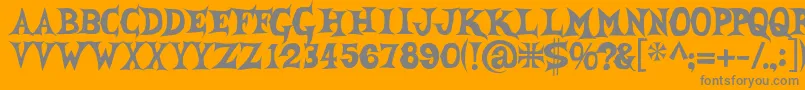 She Font – Gray Fonts on Orange Background