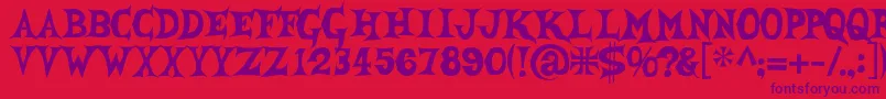 She Font – Purple Fonts on Red Background