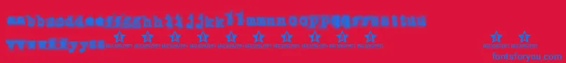 PunkbabeTrial-Schriftart – Blaue Schriften auf rotem Hintergrund