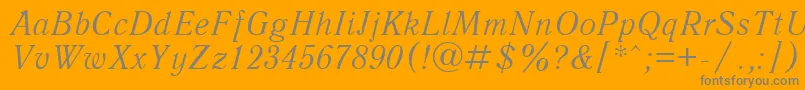 Lisätietoja UkAntiqueItalic-fontista UkAntiqueItalic-fontti – harmaat kirjasimet oranssilla taustalla