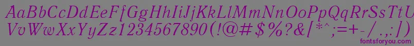 Police UkAntiqueItalic – polices violettes sur fond gris