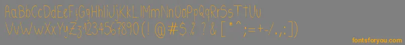 FonteKaus Font – Orange Fonts on Gray Background