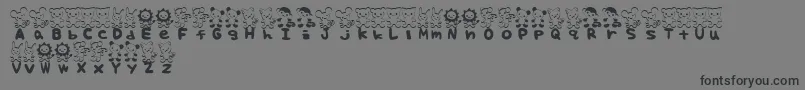 フォントTteditFont – 黒い文字の灰色の背景