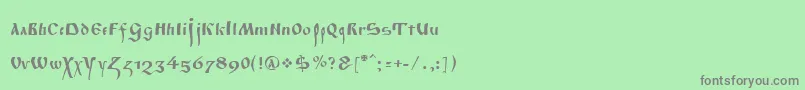 フォントPoluustav – 緑の背景に灰色の文字