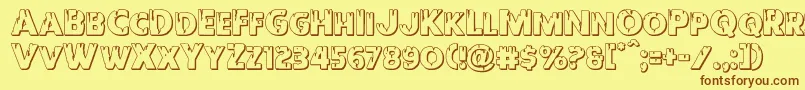 フォントRedundeadshadow – 茶色の文字が黄色の背景にあります。