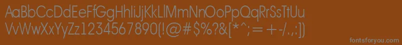 フォントAAvanteltnrThin – 茶色の背景に灰色の文字
