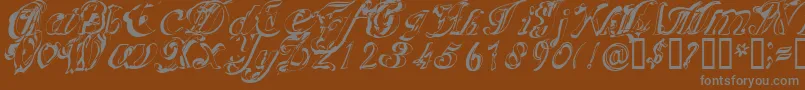 Scripteriacola Font – Gray Fonts on Brown Background