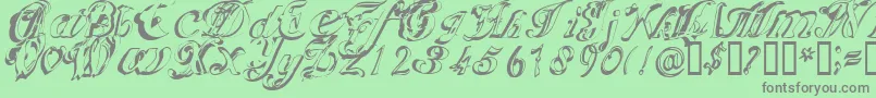 Fonte Scripteriacola – fontes cinzas em um fundo verde