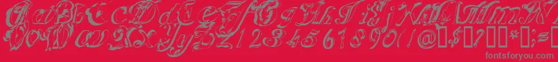 Scripteriacola Font – Gray Fonts on Red Background