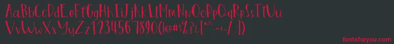 MarigoldRegular Font – Red Fonts on Black Background