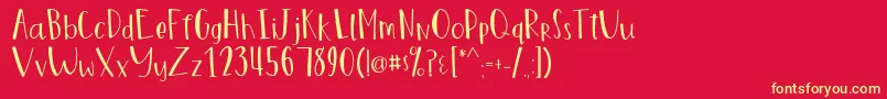 MarigoldRegular-Schriftart – Gelbe Schriften auf rotem Hintergrund