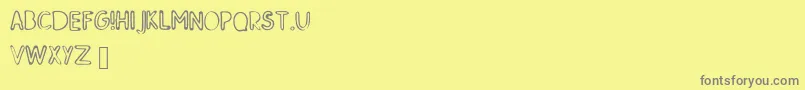 SkMildred Font – Gray Fonts on Yellow Background