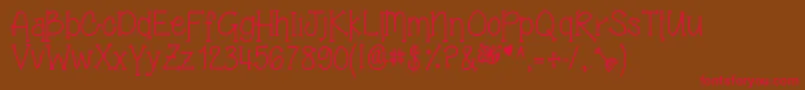 GrandmasGarden Font – Red Fonts on Brown Background