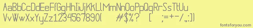 PuenteNuevoSt Font – Gray Fonts on Yellow Background