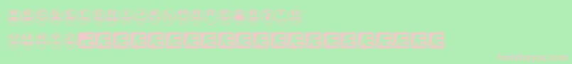 SkullCapzBrk-fontti – vaaleanpunaiset fontit vihreällä taustalla