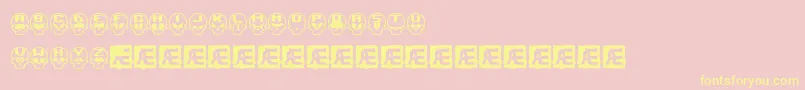 SkullCapzBrk-fontti – keltaiset fontit vaaleanpunaisella taustalla