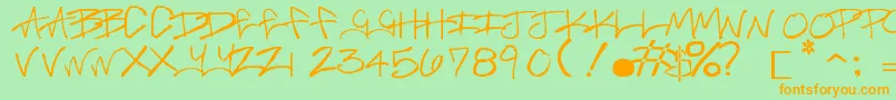 フォントBrassMonkey – オレンジの文字が緑の背景にあります。