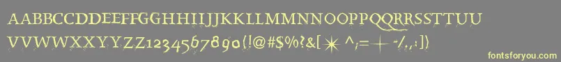 Splintermkaps Font – Yellow Fonts on Gray Background