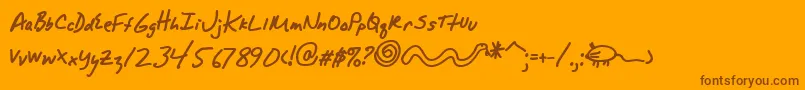 Fonte AlphamackAoe – fontes marrons em um fundo laranja