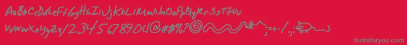 フォントAlphamackAoe – 赤い背景に灰色の文字