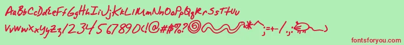 AlphamackAoe Font – Red Fonts on Green Background