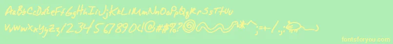 AlphamackAoe-Schriftart – Gelbe Schriften auf grünem Hintergrund