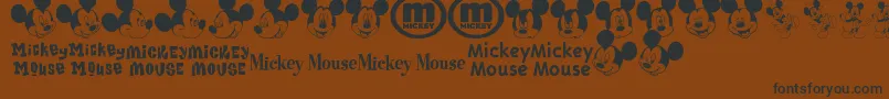 MickeyMTfb Font – Black Fonts on Brown Background