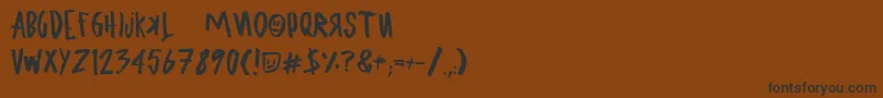 UglyboyAspekhndz-Schriftart – Schwarze Schriften auf braunem Hintergrund