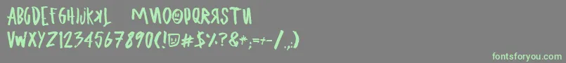 フォントUglyboyAspekhndz – 灰色の背景に緑のフォント
