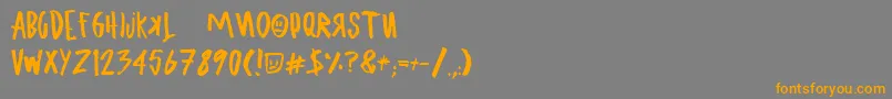 フォントUglyboyAspekhndz – オレンジの文字は灰色の背景にあります。