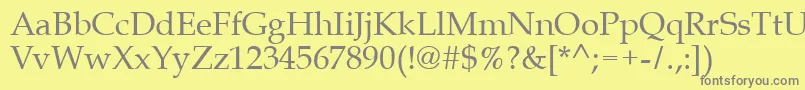 フォントQueens – 黄色の背景に灰色の文字