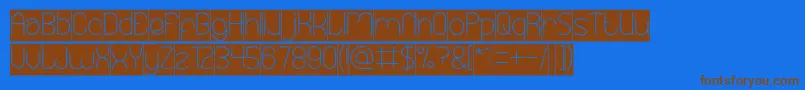 EssentialArrangementInverse Font – Brown Fonts on Blue Background