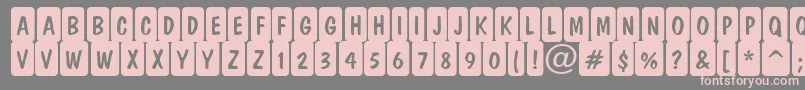 フォントDominottlcmrndcrnRegular – 灰色の背景にピンクのフォント