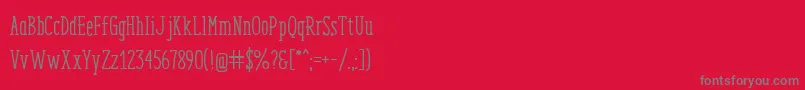 EnyoSerifMedium-Schriftart – Graue Schriften auf rotem Hintergrund