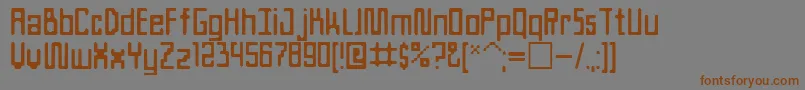 フォントAteam – 茶色の文字が灰色の背景にあります。