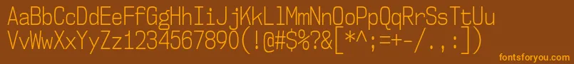 Nk57MonospaceCdLt Font – Orange Fonts on Brown Background