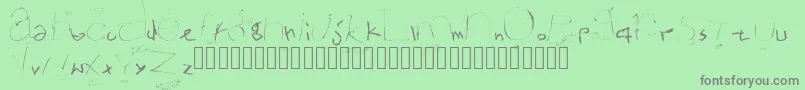 Ultramat-Schriftart – Graue Schriften auf grünem Hintergrund
