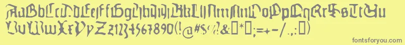 フォントGuteg – 黄色の背景に灰色の文字