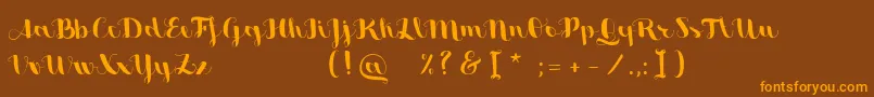 SweetheartScriptFree Font – Orange Fonts on Brown Background