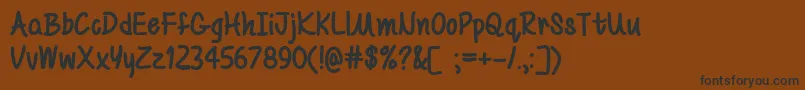 MfBeYourself-fontti – mustat fontit ruskealla taustalla