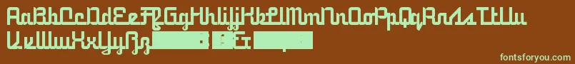 フォント5railwayScript – 緑色の文字が茶色の背景にあります。