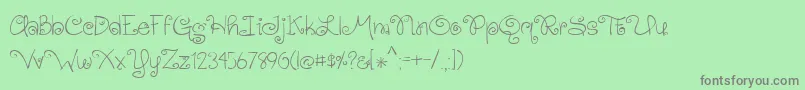 BmdGingersnaps Font – Gray Fonts on Green Background