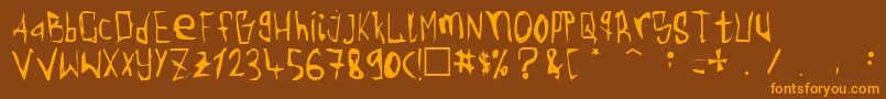 Torgny ffy-fontti – oranssit fontit ruskealla taustalla