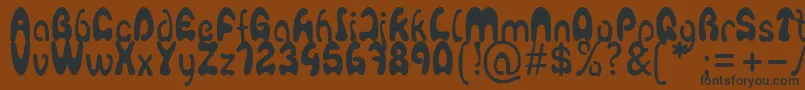 Agafont Font – Black Fonts on Brown Background