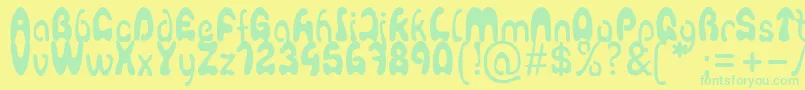 Agafont Font – Green Fonts on Yellow Background
