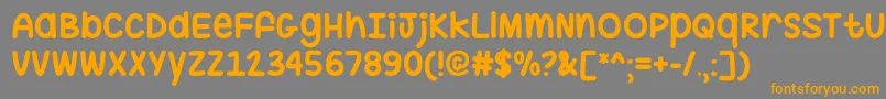 フォントHugMeTightOtf – オレンジの文字は灰色の背景にあります。