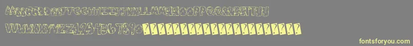 Toxicwaste Font – Yellow Fonts on Gray Background